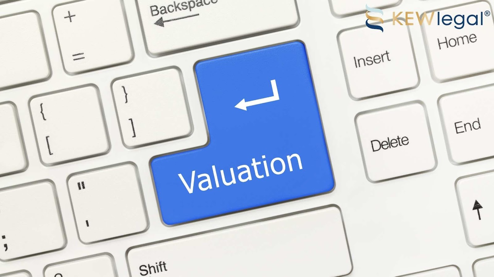 Keyboard with blue valuation key.