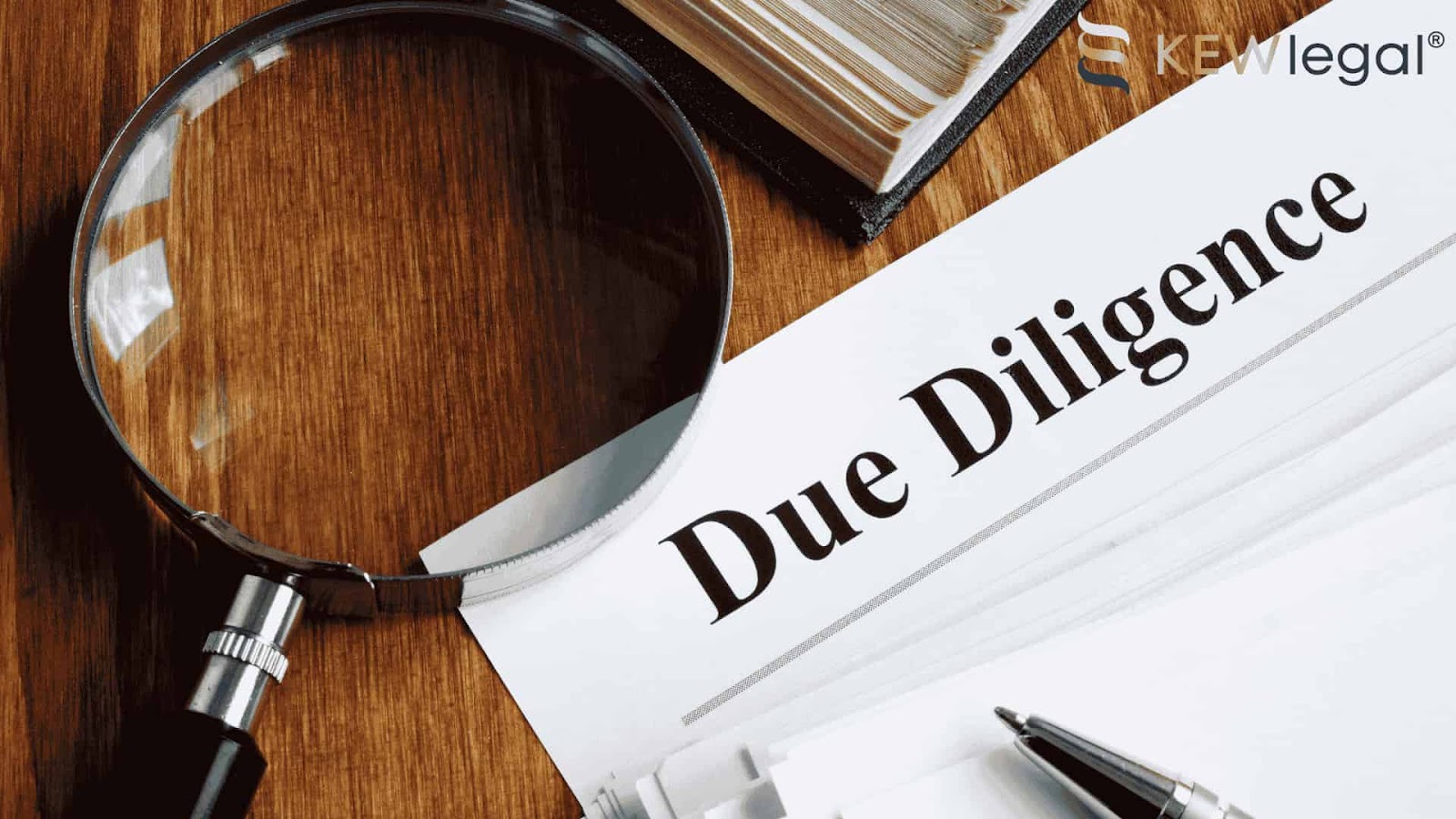 Magnifying glass on due diligence document