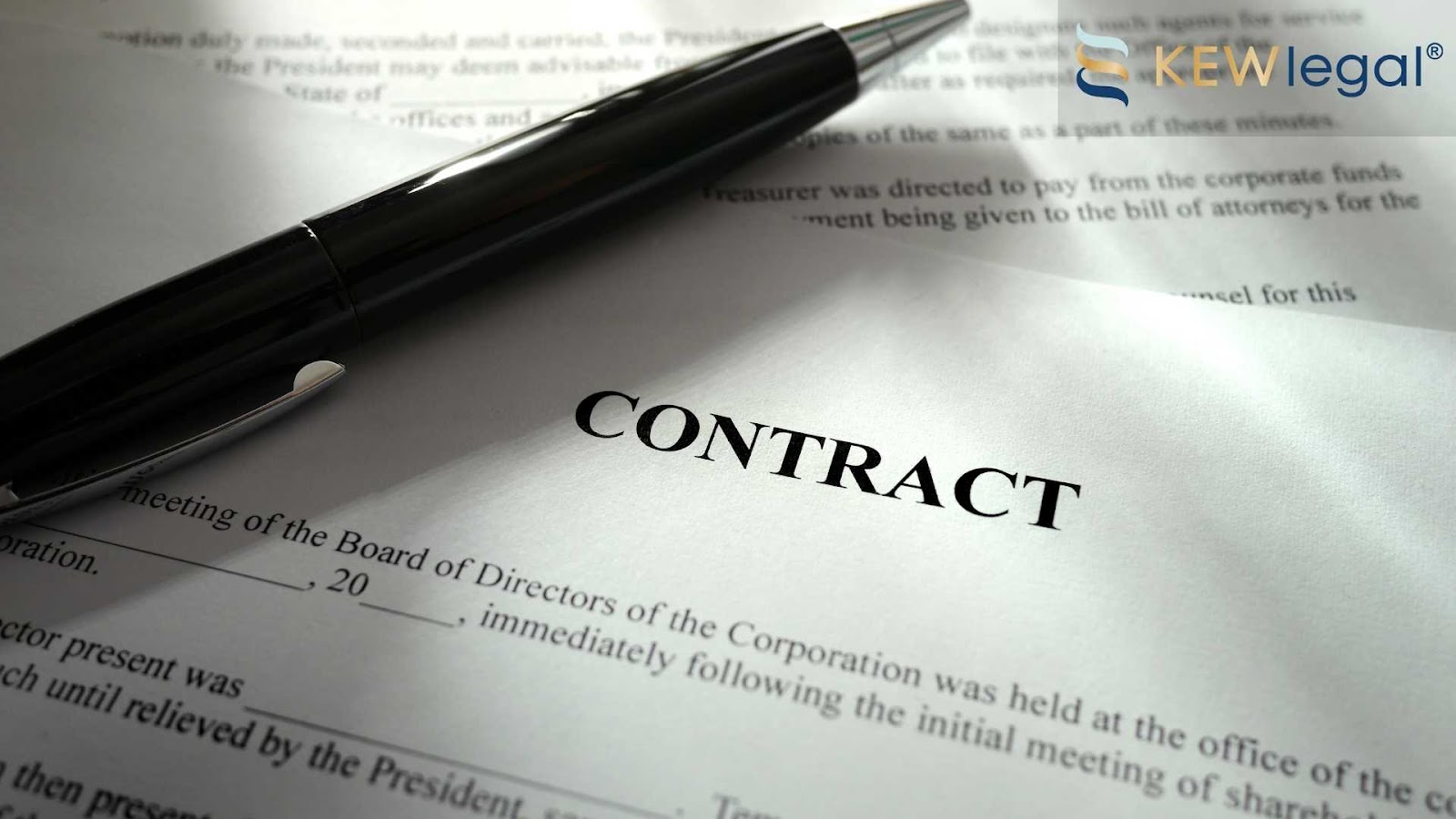 Close-up of contract document with pen.