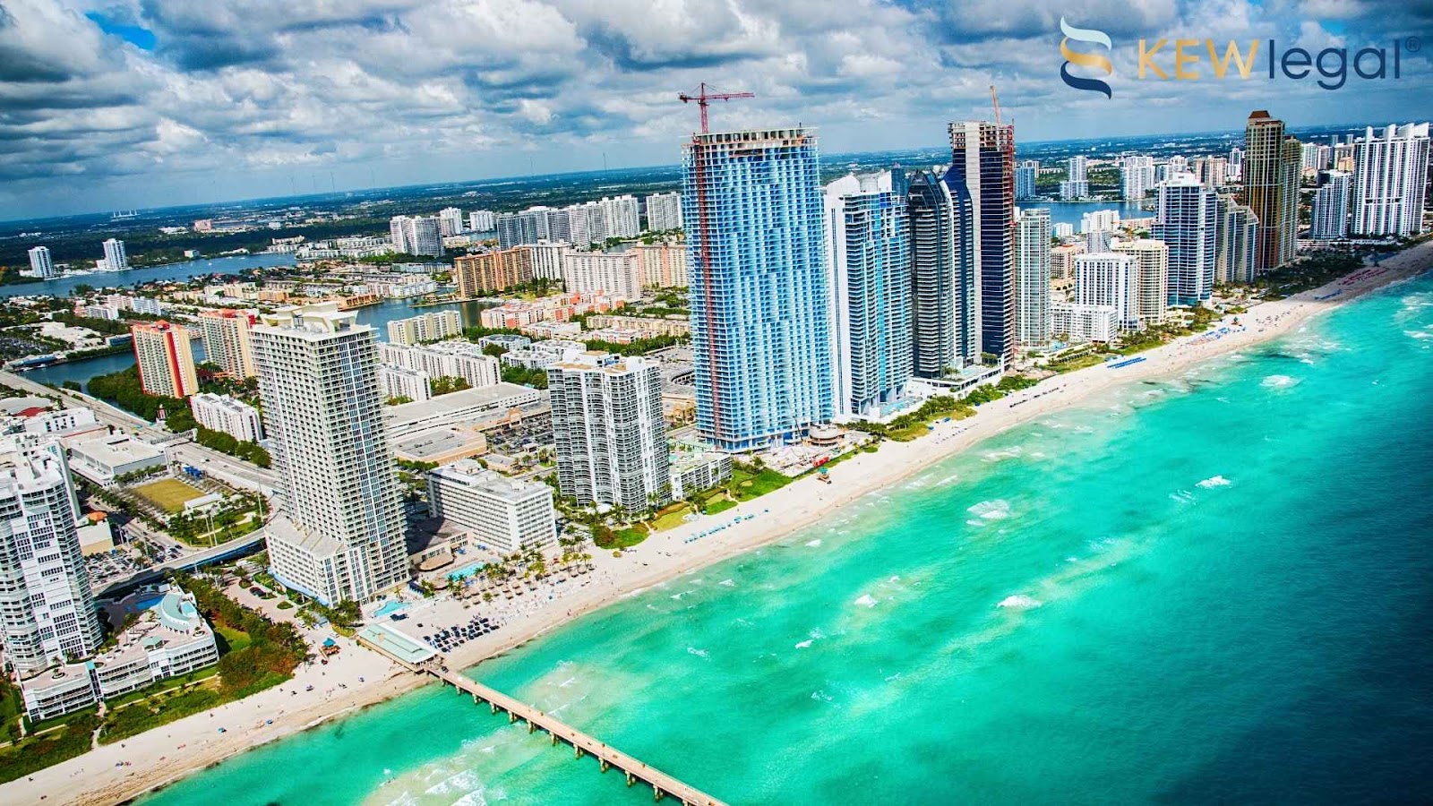 An Aerial overview of Sunny Isles Beach, where legal real estate services are essential.