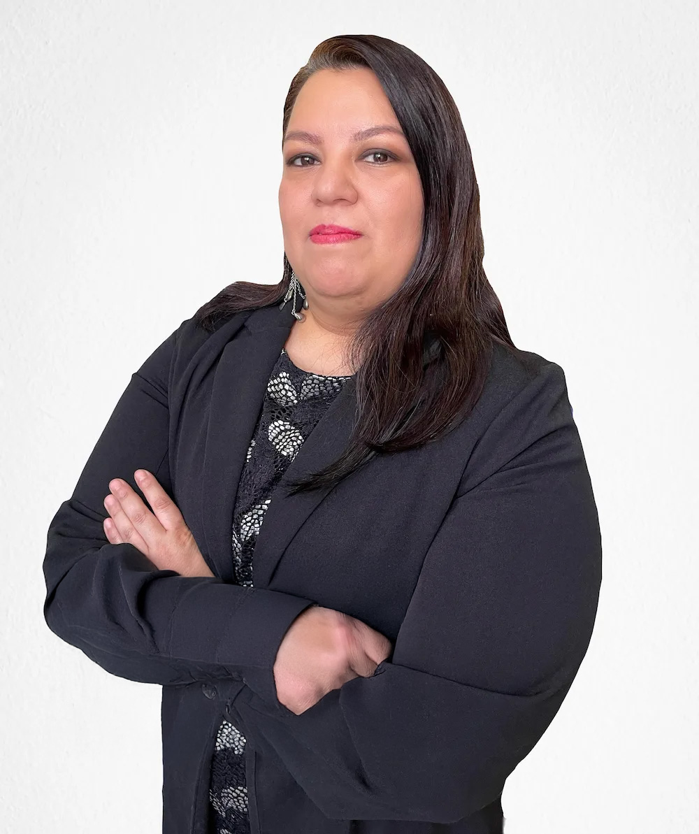 Confident person in business attire crossing arms