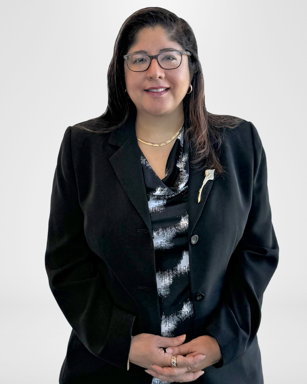 Professional woman smiling in business attire