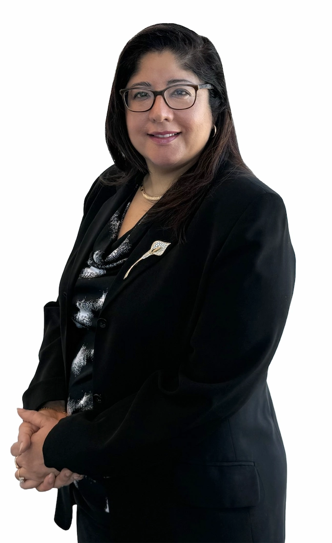 Professional woman in business attire smiling